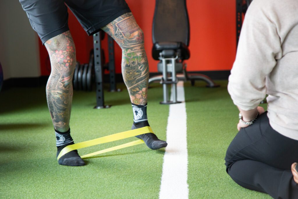 receiving physical therapy in MYo Lab Health & Wellness center