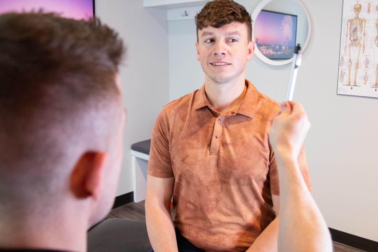 A young athlete undergoing a concussion evaluation at MYo Lab, focusing on safe recovery and personalized care.