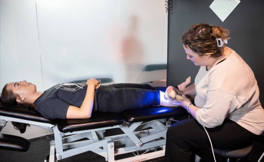 patient being treated for sports injuries by a myo lab expert