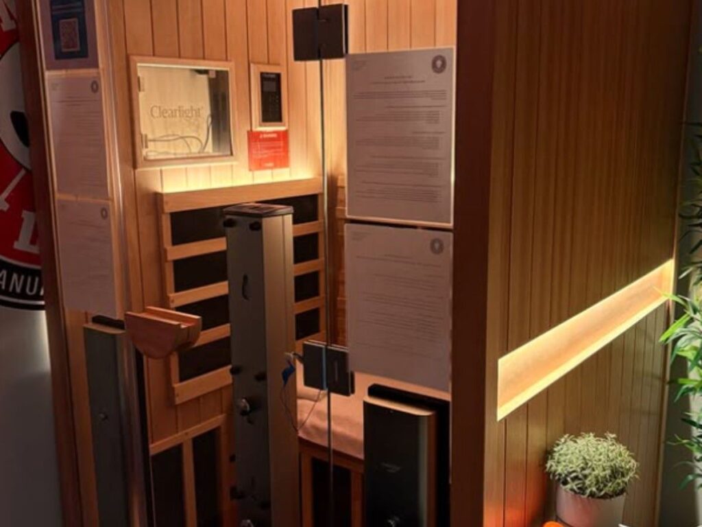 Infrared and red light therapy sauna at MYo Lab Calgary, designed for full-body relaxation, pain relief, and improved recovery in a private treatment space.